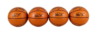 Lot of (4) Magic Johnson Signed NBA Basketballs